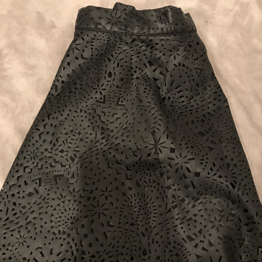 Black leather with lace looking cut outs skirt